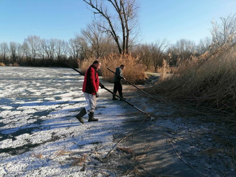 Winter work is underway on the banks of the fishing waters